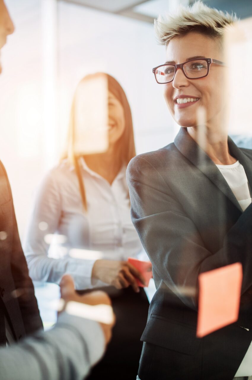 Business people planning strategy in modern office together