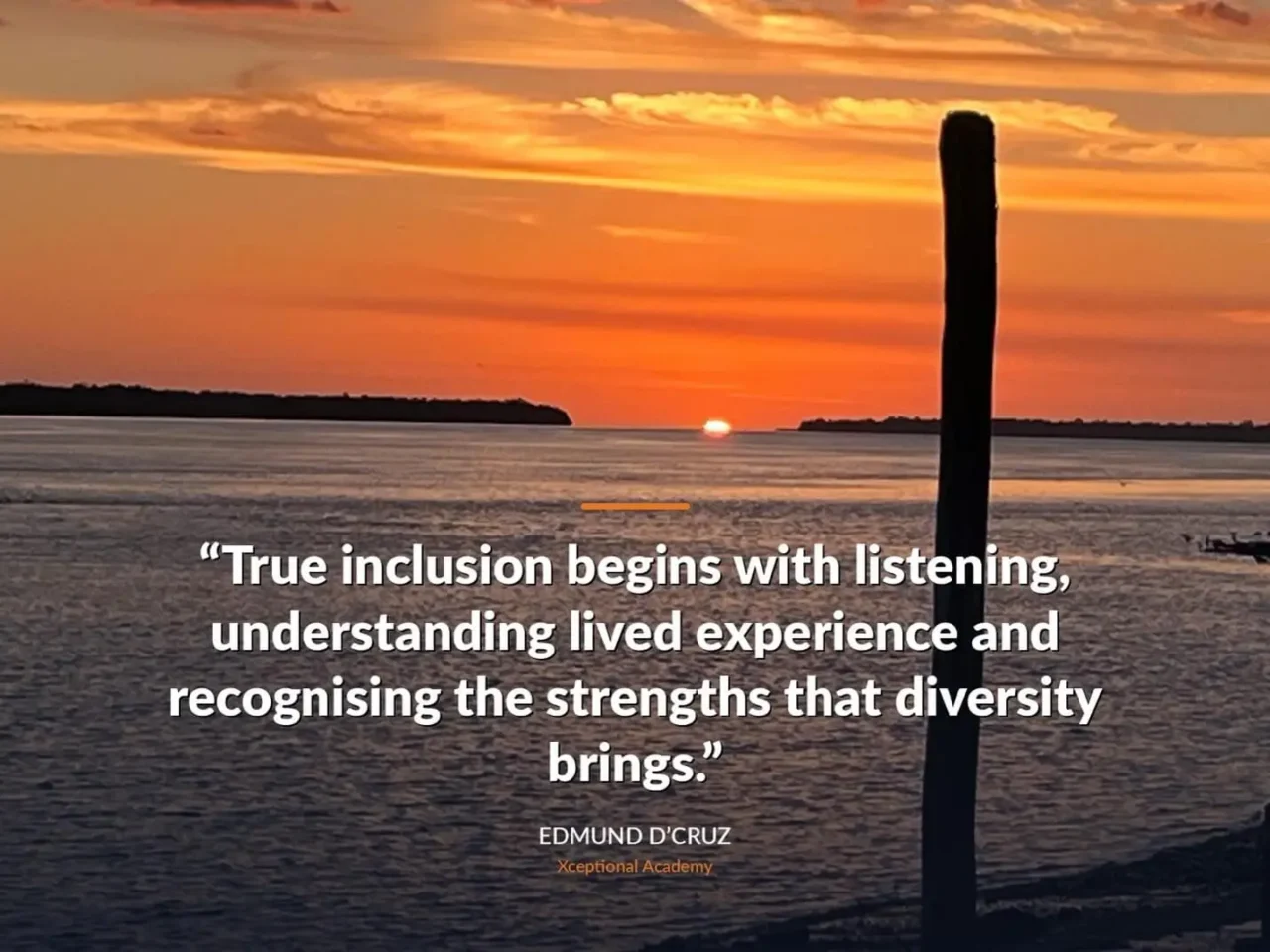 Sunset over water with quote on inclusion by Edmund D'Cruz about listening, understanding, and recognizing diversity's strengths.